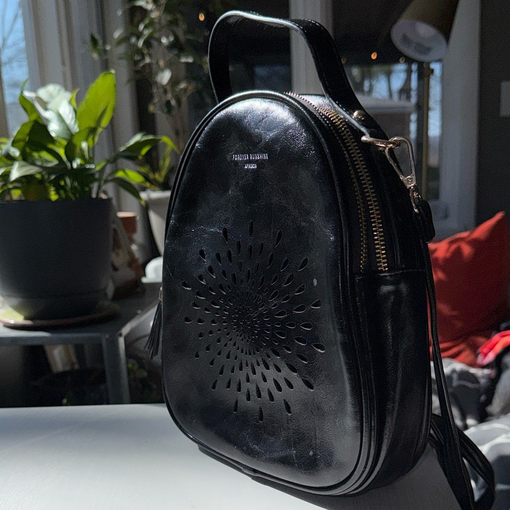 Forever Young Sleek Black Backpack